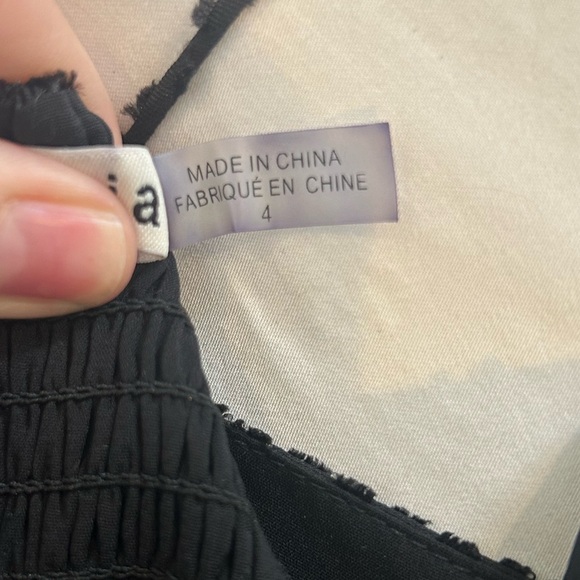 Alice + Olivia black Melvina babydoll dress mini bow front cut out size 4 - Picture 6 of 6